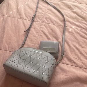 Gray crossbody Michael Kors bag and wallet set